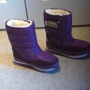 Purple winter boots.